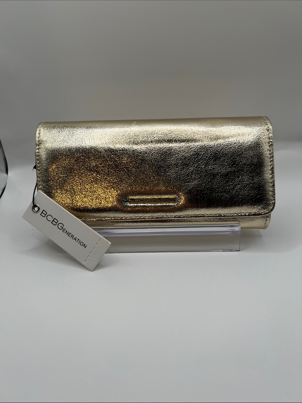 BCBGeneration Shimmery Gold Fold-Over Wallet
